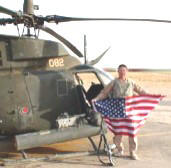 FOA team member holds up a US flag